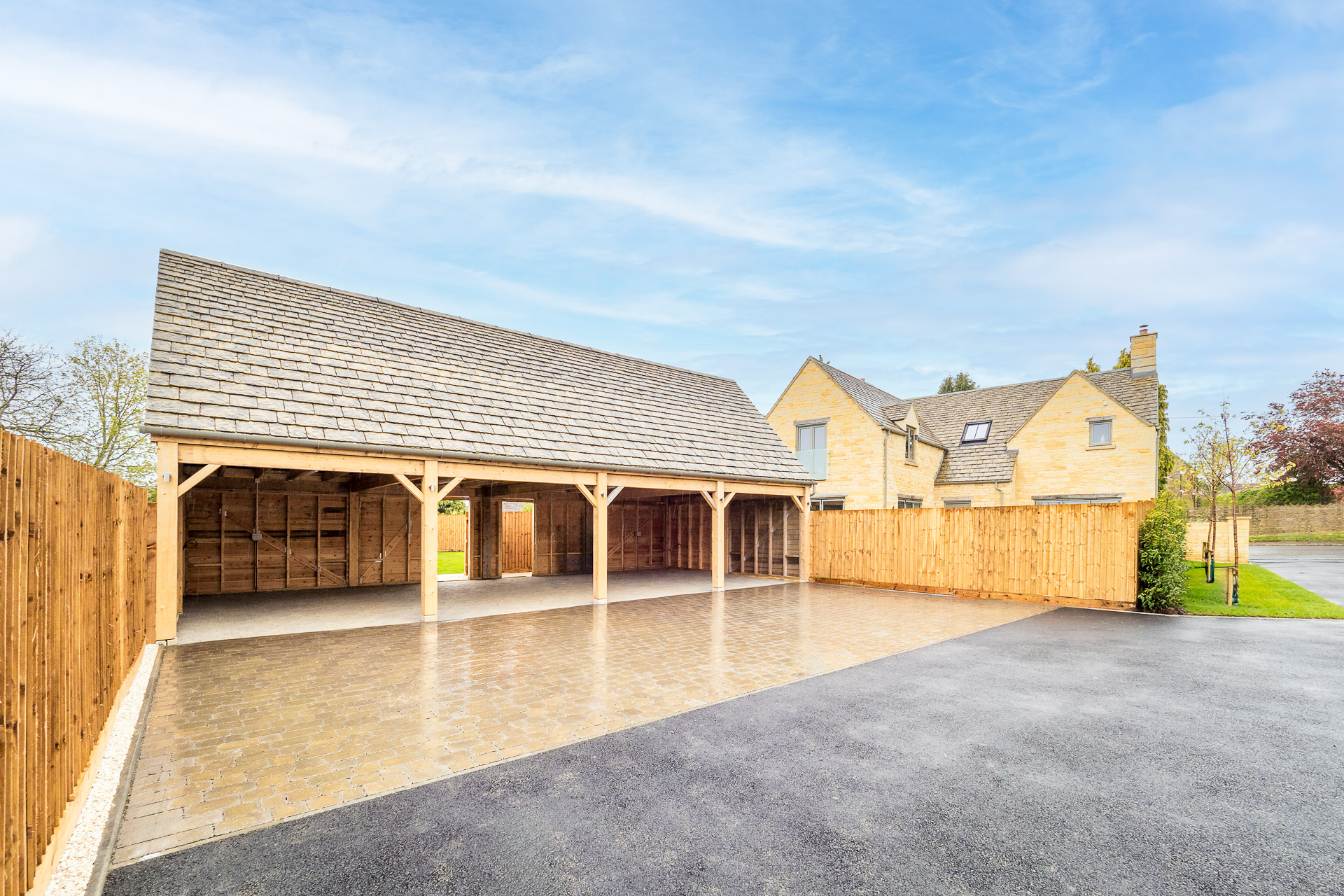Covered car park building, fits four cars