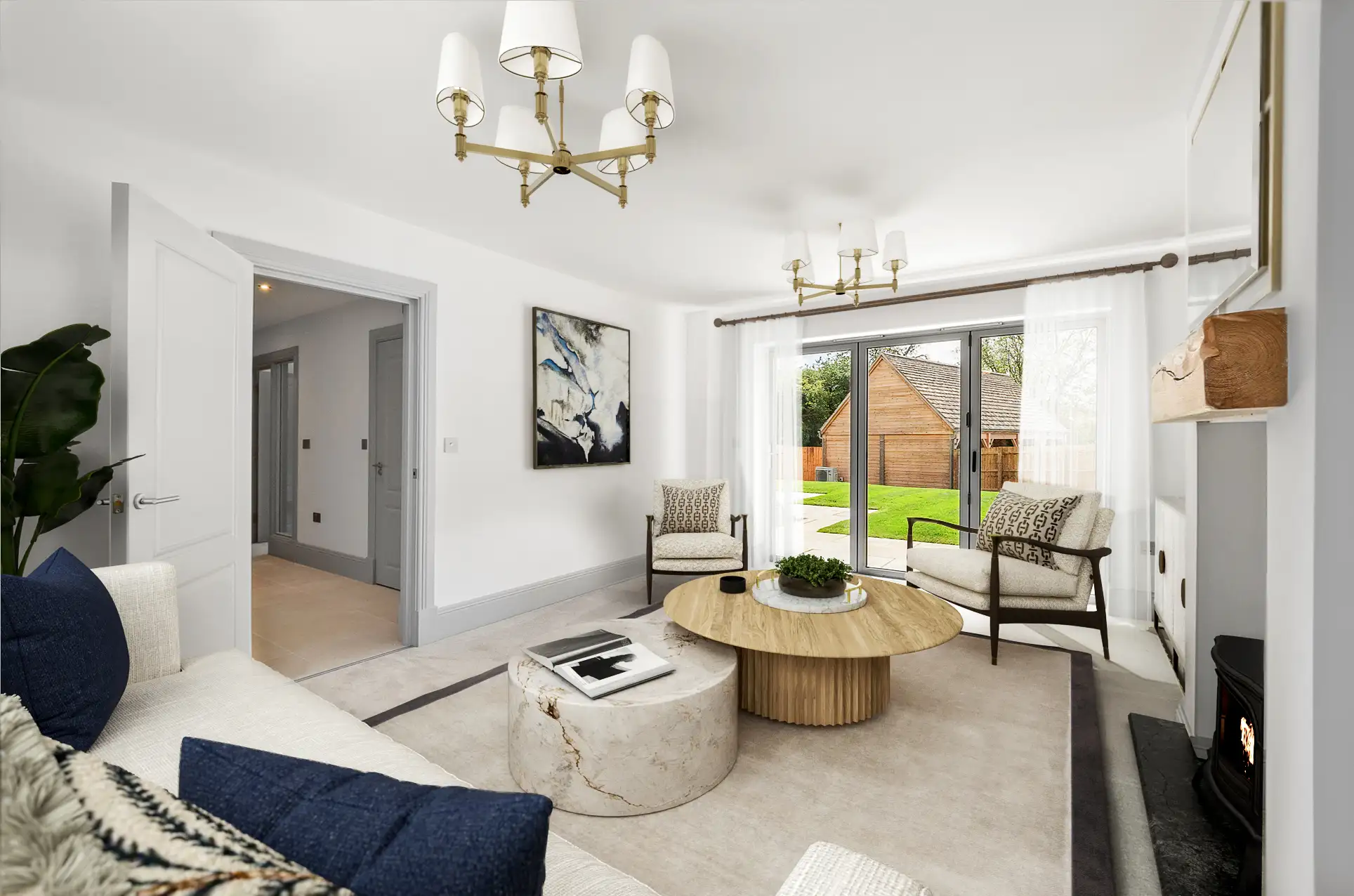 Living room with two arm chairs and round coffee tables and fireplace