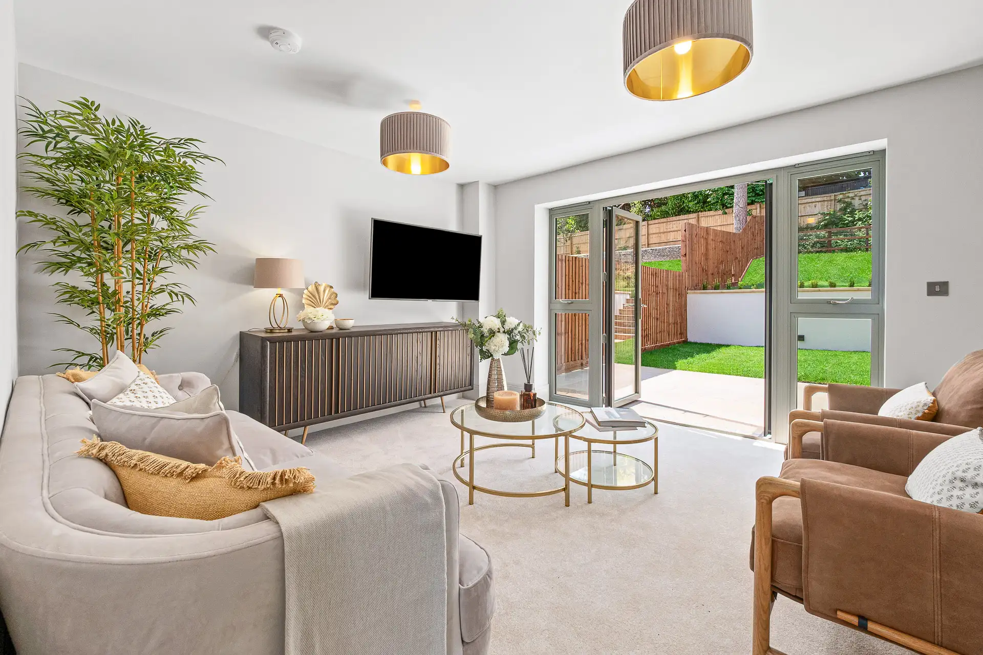 Living room with light beige carpet and patio doors