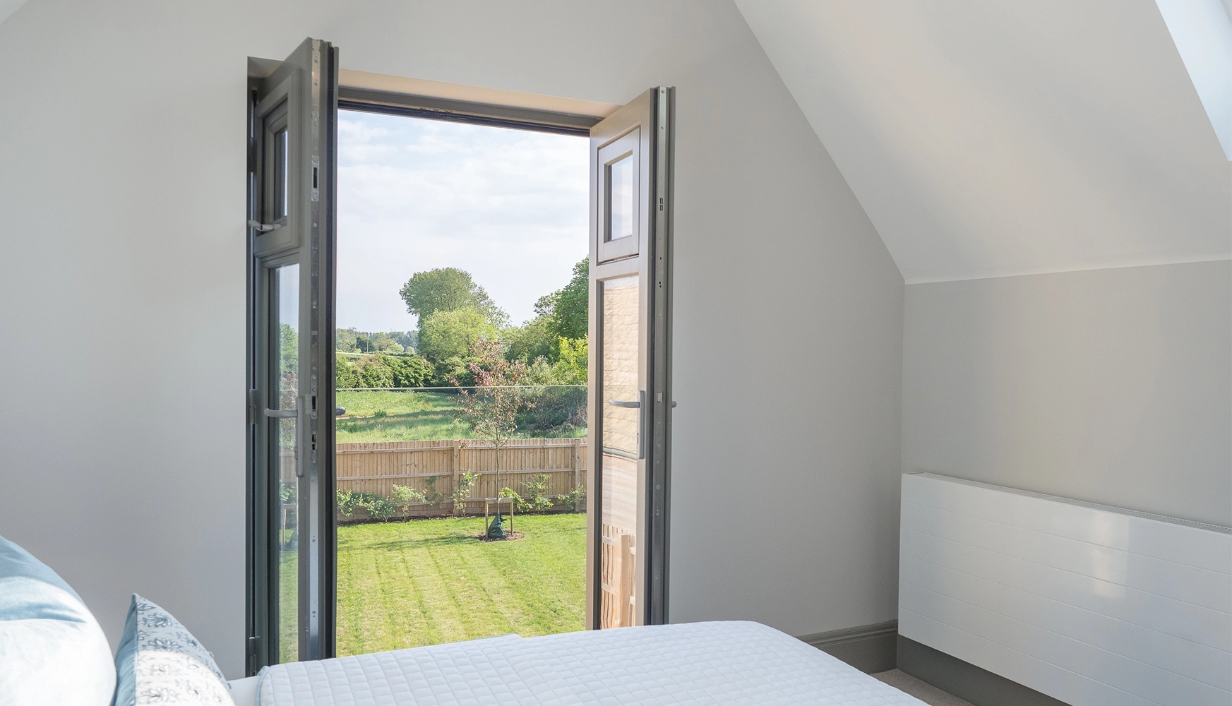 Bedroom with patio doors and balcony